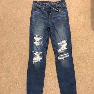 Pair of American Eagle distressed skinny jeans